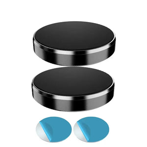 Two black metal plates with two blue circular objects on a white background