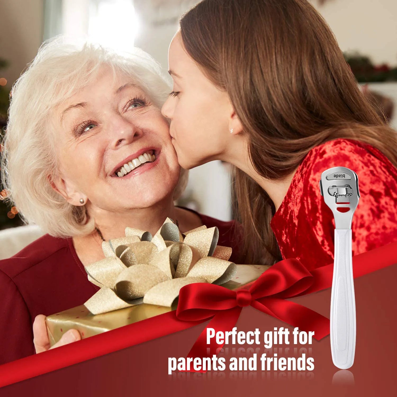 Woman kissing an older woman on the cheek with a gift and bottle opener in the foreground.