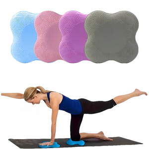 Woman performing a yoga pose on a blue balance board with other color options displayed above.