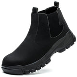 Black Chelsea boot on a white background