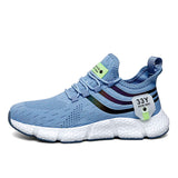 Blue running shoe with white sole on a white background