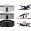 Yoga belts in gray and black with people using them for yoga poses on a white background
