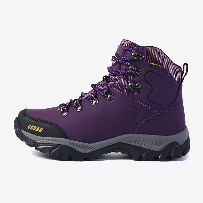 Purple hiking boot with gray sole on a white background.