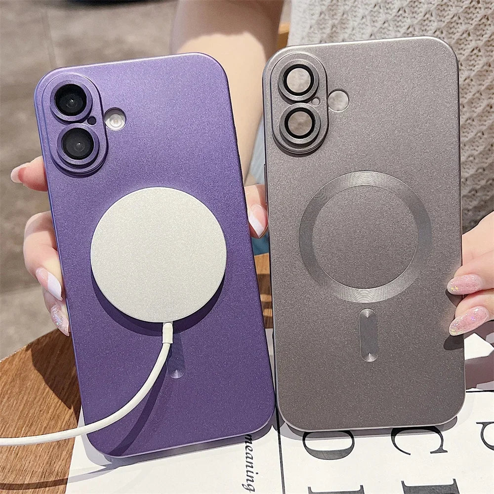 Purple and gray phone cases with magnetic pop sockets held by a person.