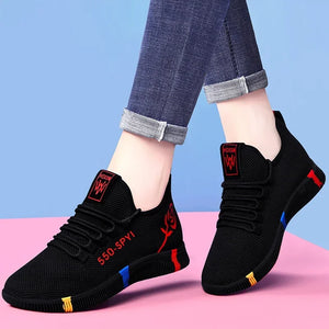 Women's lightweight stretch-fabric casual sneakers in red and purple with a low platform profile