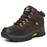 Brown hiking boot with black sole on a white background