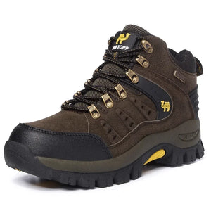 Brown hiking boot with black sole on a white background
