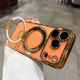 Transparent Plating iPhone Case with gold accents held by a person on a blurred indoor background