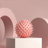 Pink textured ball on a white platform with '5pcs' text on a pink background