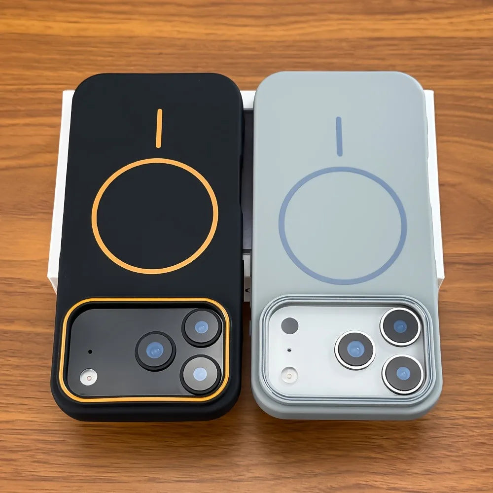 Two phone cases, one black and one gray, on a wooden surface.