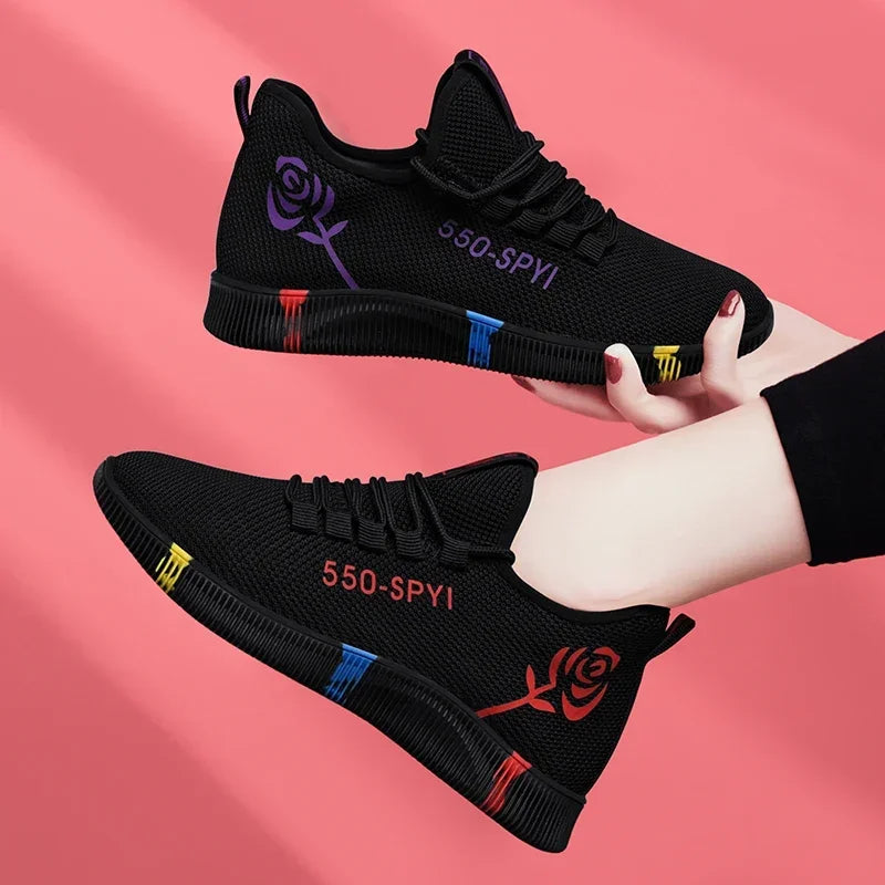 Women's lightweight stretch-fabric casual sneakers in red and purple with a low platform profile
