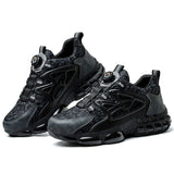 Black and gray athletic work shoes on a white background