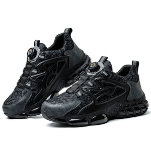 Black and gray athletic work shoes on a white background
