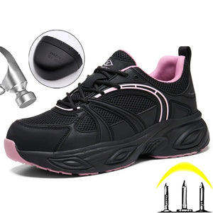 Black and pink heavy-duty women's work shoe with a circular inset showing the protective toe cap, hammer graphic on the left, and three nail icons on the bottom right, on a white background.