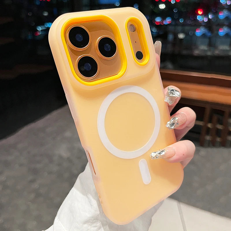 Yellow phone case with a unique design held by a person.