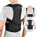 Black Adjustable back support strap for shoulder alignment and daily posture comfort worn by a person on a white background
