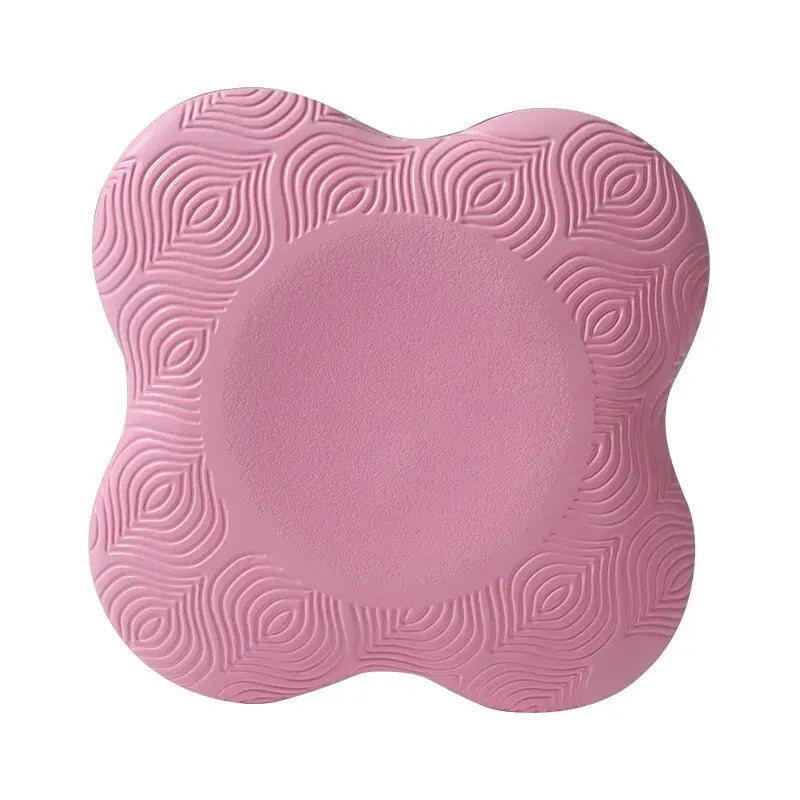 Pink cushion with textured design on a white background
