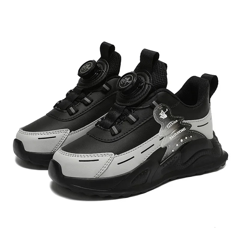 Black and gray sneakers with a brand logo on a white background