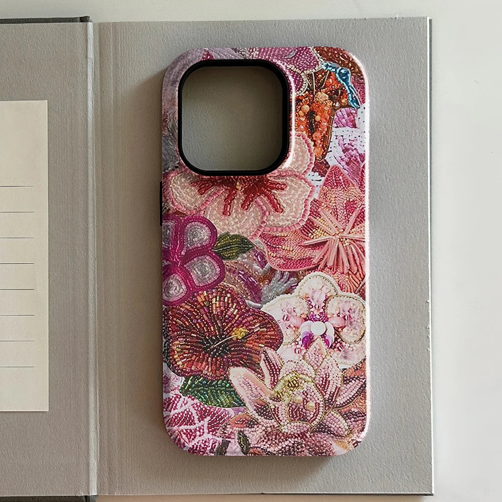 Floral patterned iphone case on a gray surface