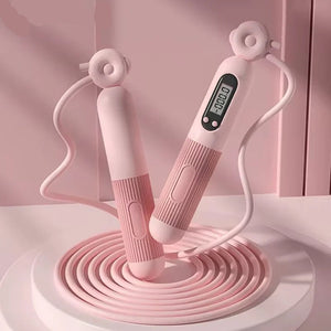 Pink Smart jump rope with digital counter on a pink background