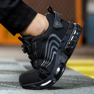 Black work shoes being worn on a blurred background