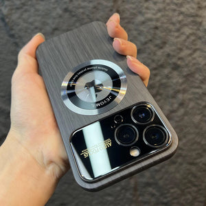 Hand holding a smartphone with a wooden iPhone case featuring a circular design