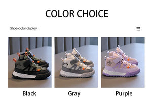 A color choice display showing three pairs of children's high-top sneakers labeled Black, Gray, and Purple, each shown on a tabletop with a neutral indoor background.