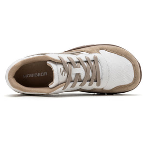 A single HOBIBEAR sneaker shown from a side profile view on a clean white background. The shoe features a white mesh upper, beige suede overlays, beige laces, and a brown interior lining with the brand name 'HOBIBEAR' printed on the insole.