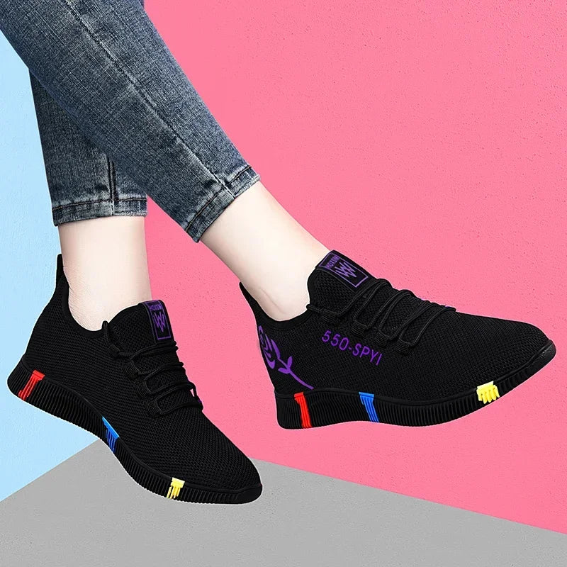 Women's lightweight stretch-fabric casual sneakers in red and purple with a low platform profile
