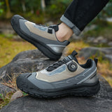 Hiking shoes on a rock with a natural outdoor background