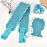 Set of blue bath mitt, scrubber, and loofah on a white surface