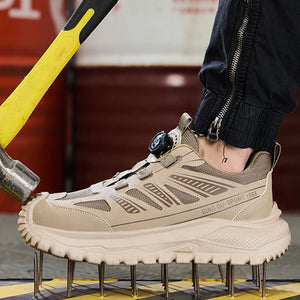 Beige work boot with metal spikes on a blurred background