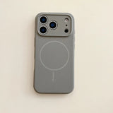 Gray phone case with magnetic design on a beige background