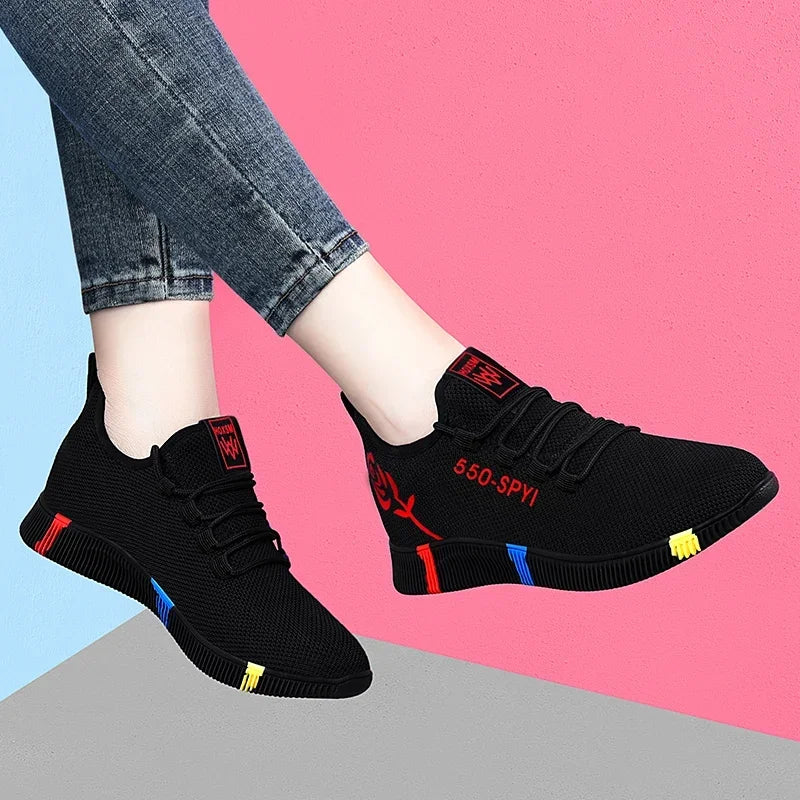 Women's lightweight stretch-fabric casual sneakers in red and purple with a low platform profile