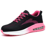 A black and pink Women's Safety Work Shoes with a breathable mesh upper, pink laces, a pink collar lining, and a white and pink sole featuring a visible air cushion unit.