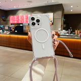 Clear iphone case with strap held in a hand in a casual setting