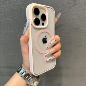 Hand holding a phone with a clear case against a gray background