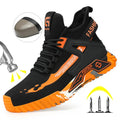 Black and orange safety shoes with a close-up of a nail and a hammer on a white background