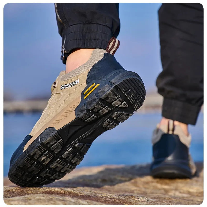 Close-up of hiking shoes with brand name on a natural background