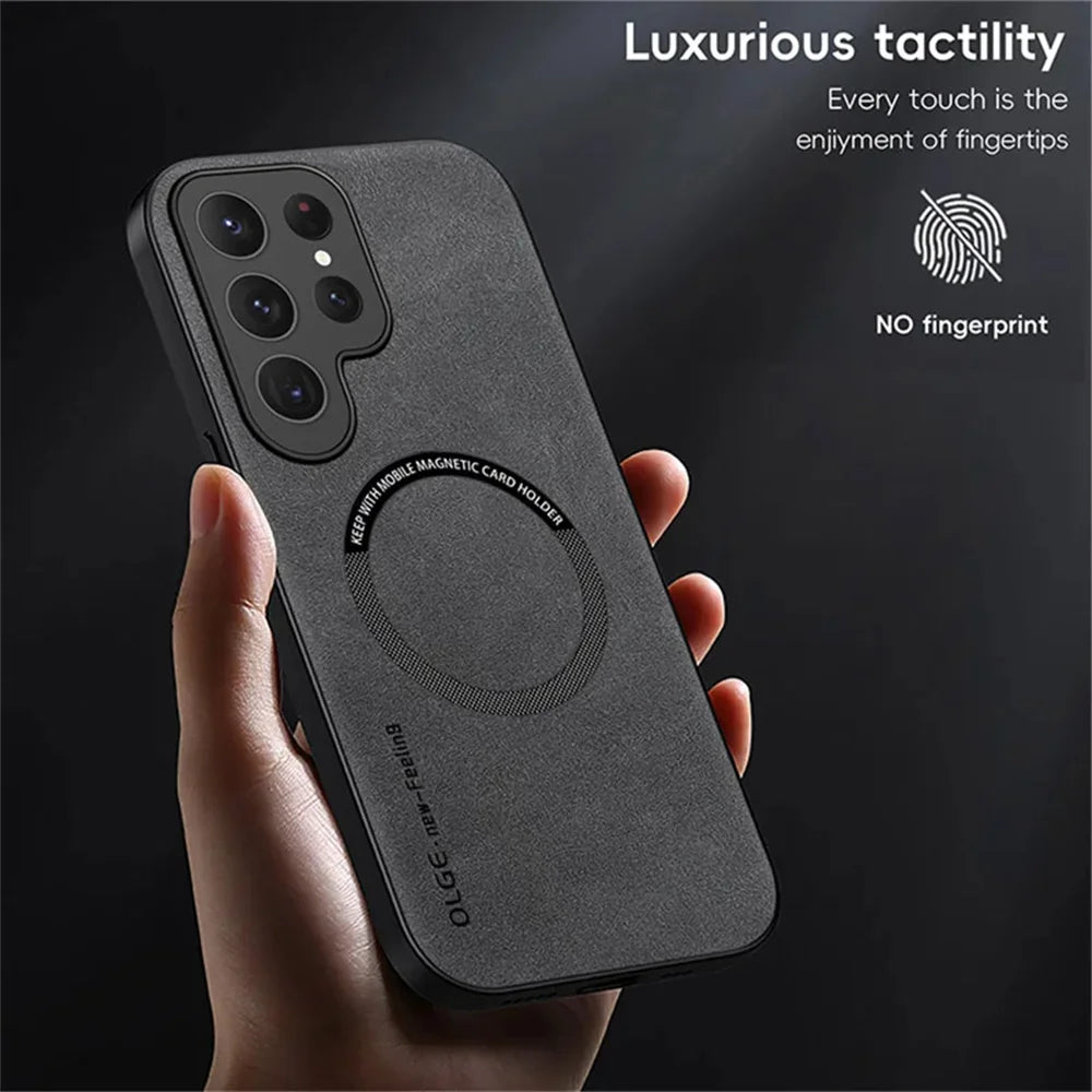 Black phone case with magnetic card holder held by a hand, on a dark background.