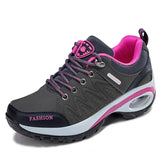 Gray and pink sneaker with 'Fashion' text on a white background