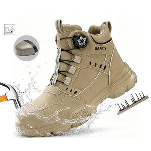A beige safety work boot with a circular buckle closure and 'SAFETY' printed on the side, shown on a white background with splash effects, a hammer, and a spiked tool. A small inset shows a close-up of the buckle.