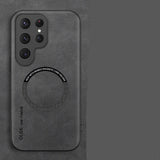 Dark gray phone case with a magnetic card holder on a matching background
