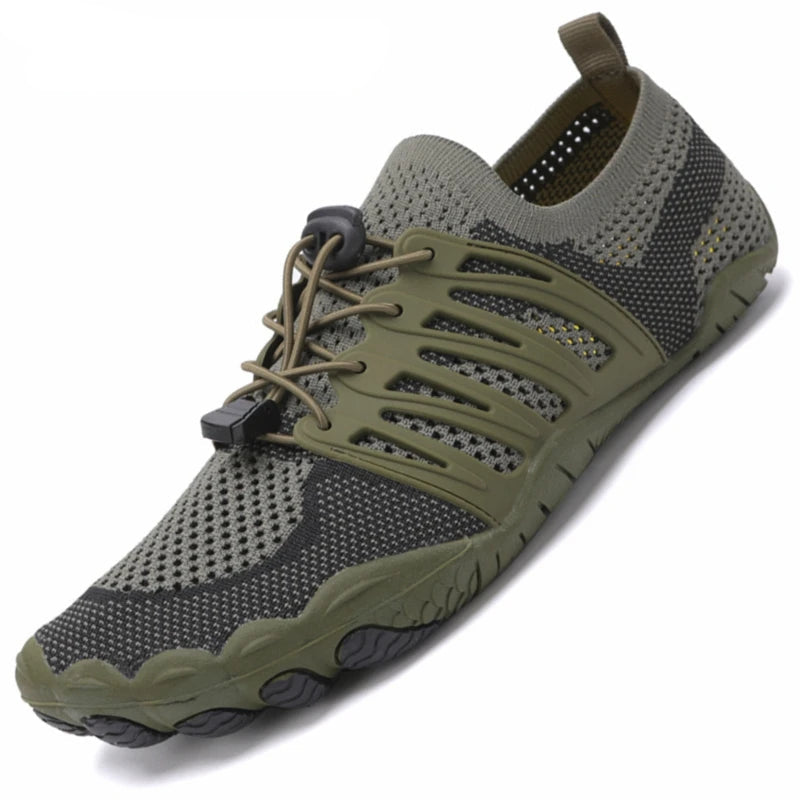 Green and gray athletic shoe with visible brand logo on a white background