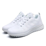 White running shoes on a white background