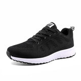Black running shoe with white sole on a white background