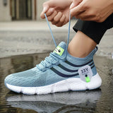 Blue athletic shoe with white sole being worn on a wet pavement surface