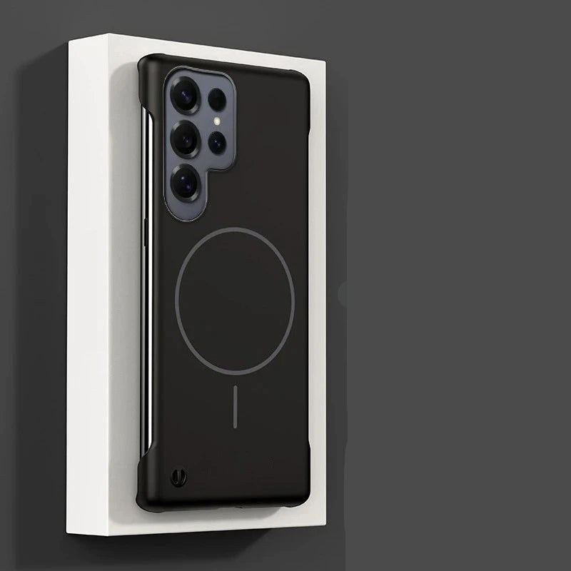 Black phone case with magnetic feature on a white stand against a dark background