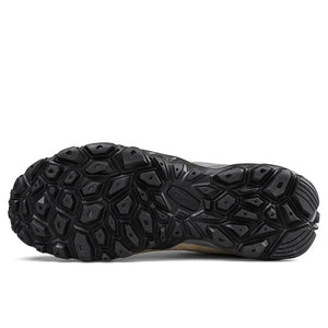 Close-up of a black athletic shoe sole on a white background