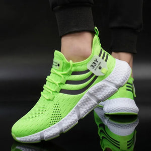 Bright green running shoes with white soles on a reflective surface.